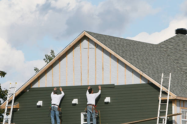 Professional Siding Installation technician working in Climax, NC